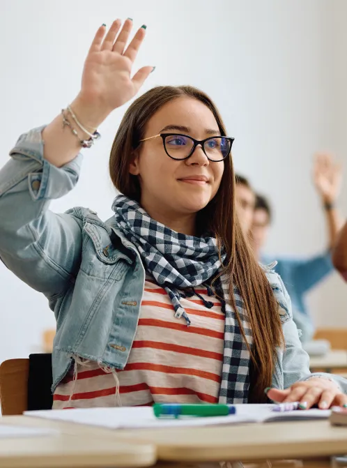 high school student with hand raised